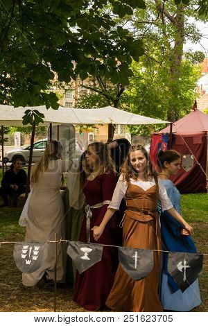 Ploiesti, Romania - July 14, 2018: Dressed Up Ladies Reproduce Old Medieval Dance In Outdoor Scene A