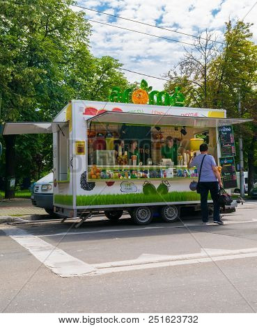 Ploiesti, Romania - July 14, 2018: Man Buying Fresh Lemonade From Street Food Truck At The Medieval 