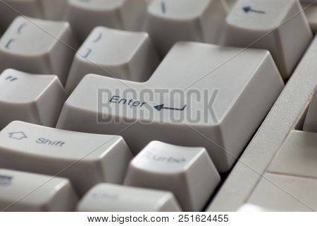 White Old Computer Keyboard Close-up. Focused On Enter Key