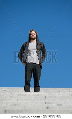 Reach Out For Top. Man Handsome Guy Enjoy Morning Walk On Stairs Blue Sky Background. Morning Fill E