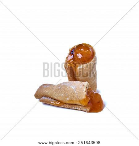 Cookies Rolled With Cherries And Black Currants Isolated On A White Background. Sweet Dessert.