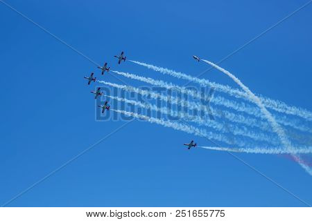 Torre Del Mar, Spain - July 29, 2018. Red Aircrafts Aerobatic Group From The Swedish Patrol Performi