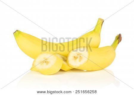 Group Of One Whole One Half Three Slices Of Fresh Yellow Banana Isolated On White Background