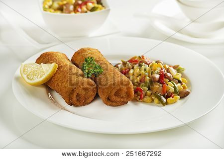 Bread Crumbs Rolls Filled With Ham And Cheese. Fried Cannelloni Or Rolls.