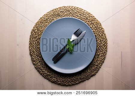 Top View Of A Restaurant Table With Plate, Knife And Fork, Restaurant Concept