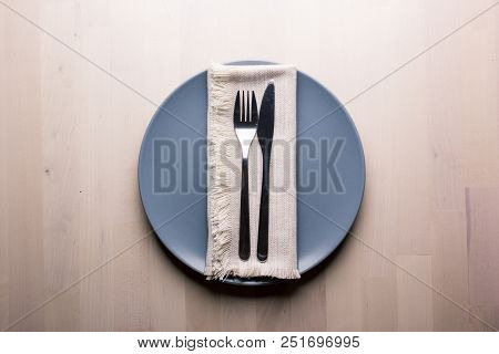 Top View Of A Restaurant Table With Plate, Knife And Fork, Restaurant Concept