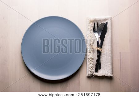 Top View Of A Restaurant Table With Plate, Knife And Fork, Restaurant Concept