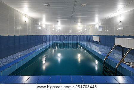 Moscow - May 2, 2018: Swimming Pool In Hotel Or Residential House. Modern Pool Interior With Blue Ti