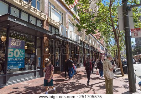 Old Navy Storefront With Flying American Flgs On Market Street Downtown San Francisco