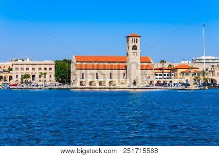 Colossus Of Rhodes And Evangelismos Church Or Ekklisia Evaggelismos In Rhodes Island In Greece