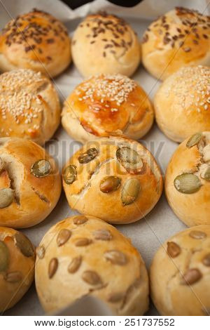 Fresh Homemade Hamburger Buns, Brioche With Sesame, Pumpkin, Flax, Sunflower Seeds On The Tray, Conc