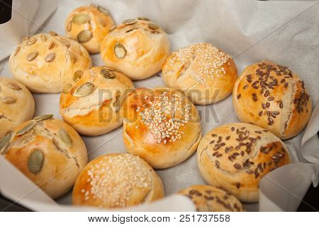 Fresh Homemade Hamburger Buns, Brioche With Sesame, Pumpkin, Flax, Sunflower Seeds On The Tray, Conc