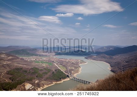 Aerial View Of Tsonevo Reservoir And Tsonevo Village, Near The Rock Phenomenon Wonderful Rocks Bulga