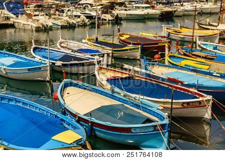 Old Boats In Nice Marina.
Fishing Boats Anchored In Nice Marina, French Riviera, France.
