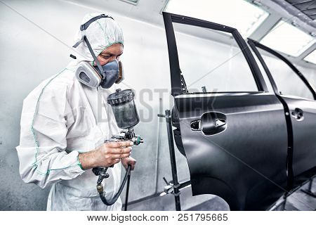 Restoration Painting Of A Black Car In The Service Center.