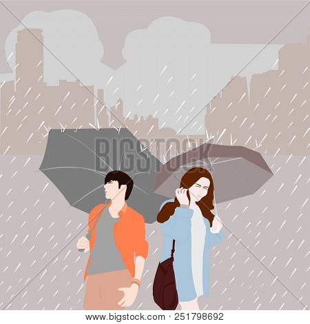 Man With Umbrella And Women With Umbrella On Rainy Season In The City.