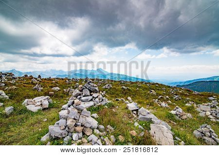 Stone Piles On Mountain Trail