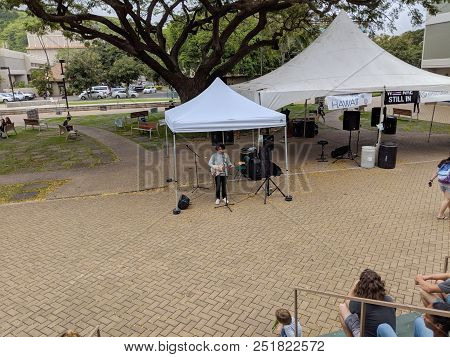 Honolulu - April 19, 2018:  Musician Josh Sharp Jams At Earth Day Concert Festival On The University