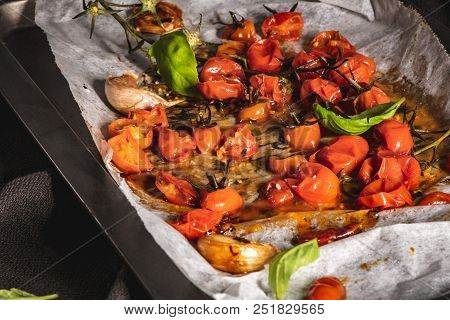 Roasted Cherry Tomotoes. Mediterranean Food Recipe Idea.