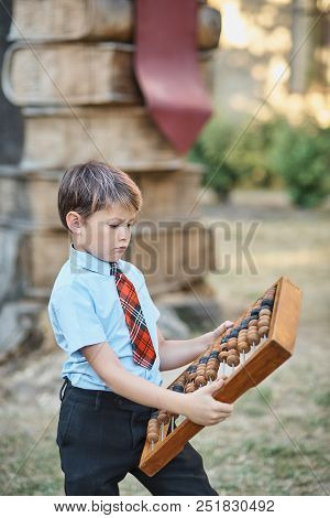 Boy With Large Abacus