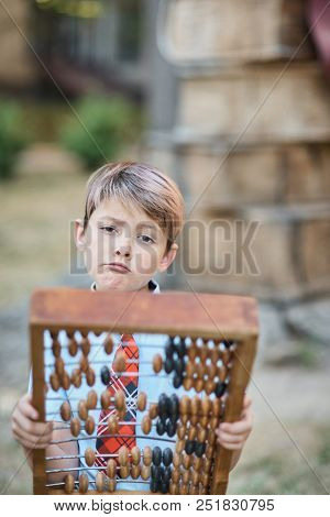 Boy With Large Abacus