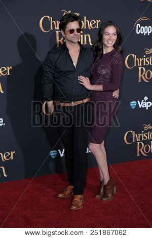 LOS ANGELES - JUL 30:  John Stamos, Caitlin McHugh at the 