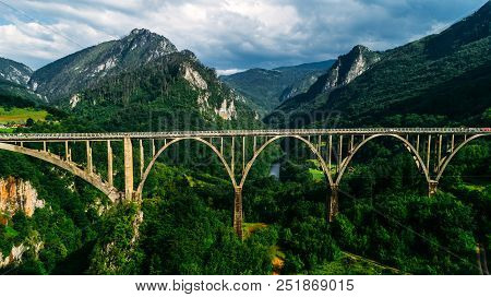 Aerial View Of Durdevica Tara Arc Bridge In The Mountains, One Of The Highest Automobile Bridges In 