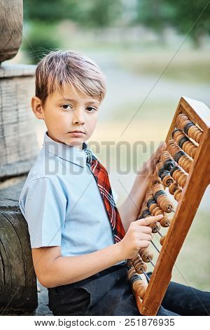 Boy With Large Abacus