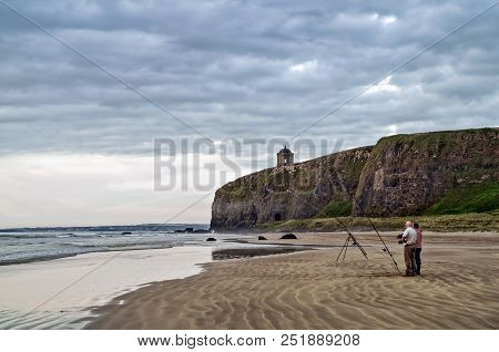 Fishermen On Benone Beach Near The Mussenden Temple
