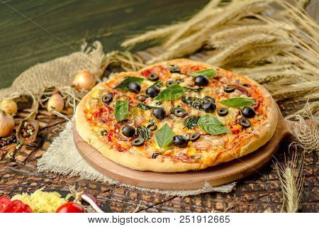 Tasty Pizza With Vegetables And Basil