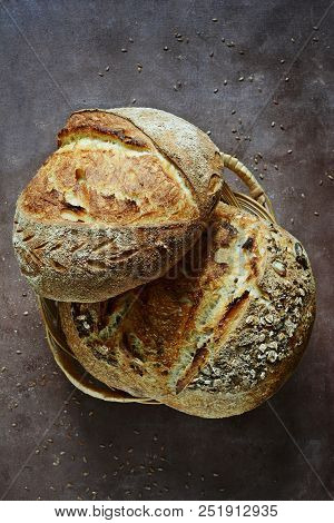 Fresh Homemade Bread On A Dark Background. Crisp. French Bread.  Bread At Leaven. Unleavened Bread