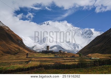 View of Mount Shhara. Ushguli community, church of Lamaria in a mountain valley. Zemo Svaneti, Georgia