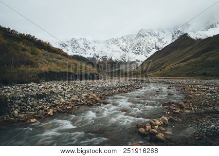 Inguri - mountain River. Autumn landscape. Caucasus, Georgia, Zemo Svaneti. 