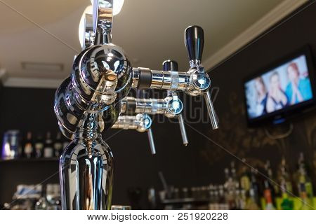 Crane Defoamer For Bottling Beer Installed On The Bar In The Restaurant