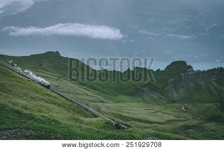 Old Steam Train On A Mountain Track In The Swiss Alps, Brienzer Rothorn Bahn In Switzerland