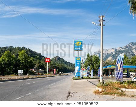Kemer, Turkey - May 16, 2018. Cars Moving Pass Gas Stations Petrol Ofisi And Aygaz.