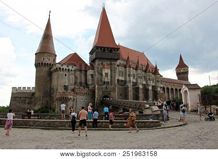 Hunedoara, Romania - June 18: Tourists Visiting The Amazing Corvin Castle In Hunedoara