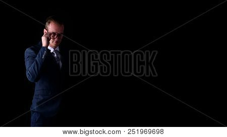 Concept Business People. Businessman On The Background. Businessmen Look Dastardly. Businessmen Show