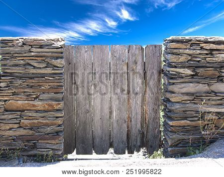 Nature Summer Landscape. Countryside View And Rustic Gate In Drystone Wall In Village Cadaces, Spain