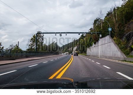 Editorial 08.31.2019 Oslo Norway Passing A Road Toll Station Outside Oslo City With Several Other Ca