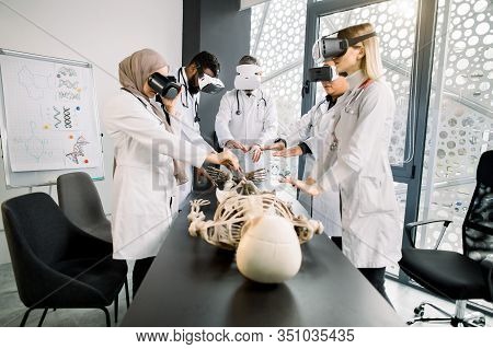 Education, Science, Vr, Medical And Health Concept. Group Of Multiethnic Doctors, Biologists, Archeo