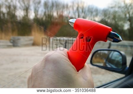 Safety Hammer Being Used To Smash Window Glass During Car Crash Emergency