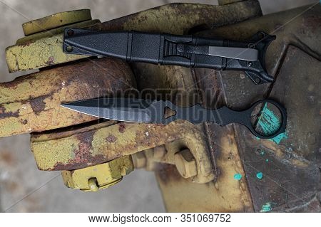 Top View On A Military Knife And Case. Flat Lay.