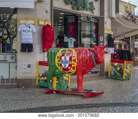 January 2020, Lagos, Algarve, Portugal - Statue Of A Cow In The Colours Of The Portuguese Flag, In T