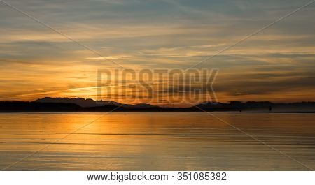 Sunset In The Somo Beach With Orange Sky