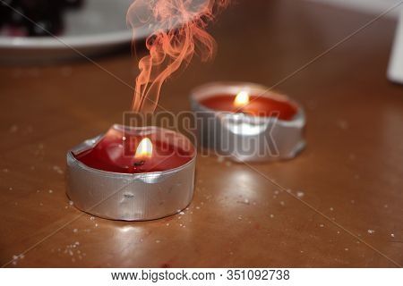 Two Red Burning Candles, Mystic Red Soke And Sugar On Table
