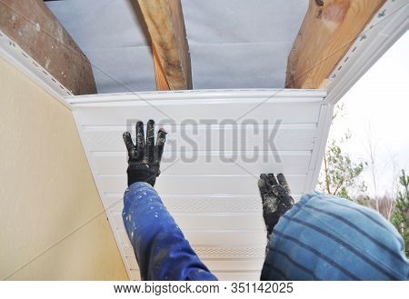 Roofer Repair Soffit Boards. Eaves & Soffit Linings. House Roof Eaves Soffit Installation.