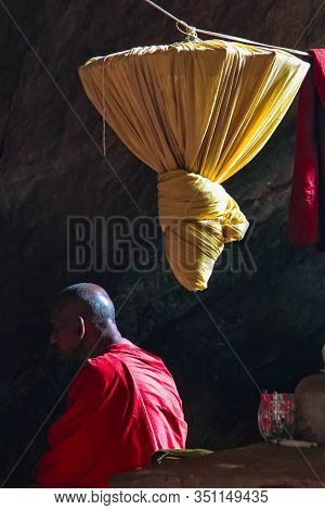 Hpa-an, Myanmar - Nov 06, 2019: Monk Inside Of Kaw Ka Thaung Cave, Located Close To Hpa-an, Myanmar