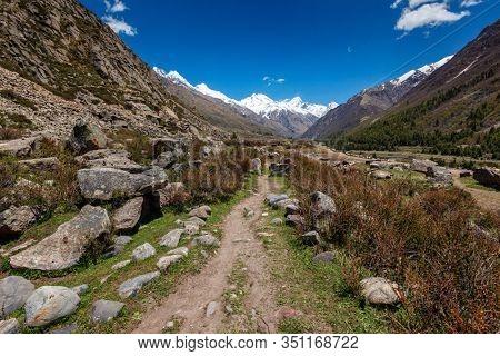 Old trade route in Himalaya surrounded with stones to Tibet from Chitkul village from Sangla Valley. Himachal Pradesh, India