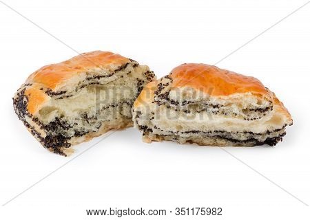 Baked Small Poppy Seed Roll Broken In Half On A White Background
